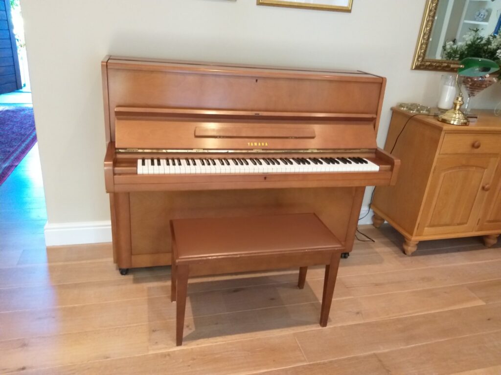 Yamaha P2 upright piano with matching bench